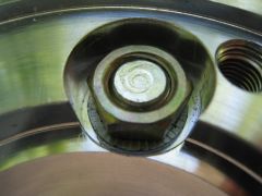 Detail of stub nut w/ Nord-Lock washer and blue loctite, torque to 58 ft-lb