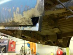 Metal removed from passenge lower rear quarter
